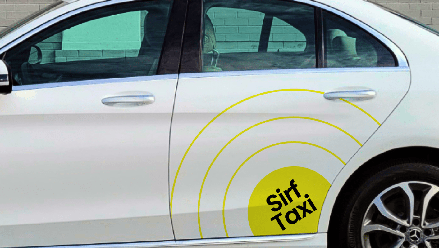 The image of sirf taxi branding in the taxi designed by Wings