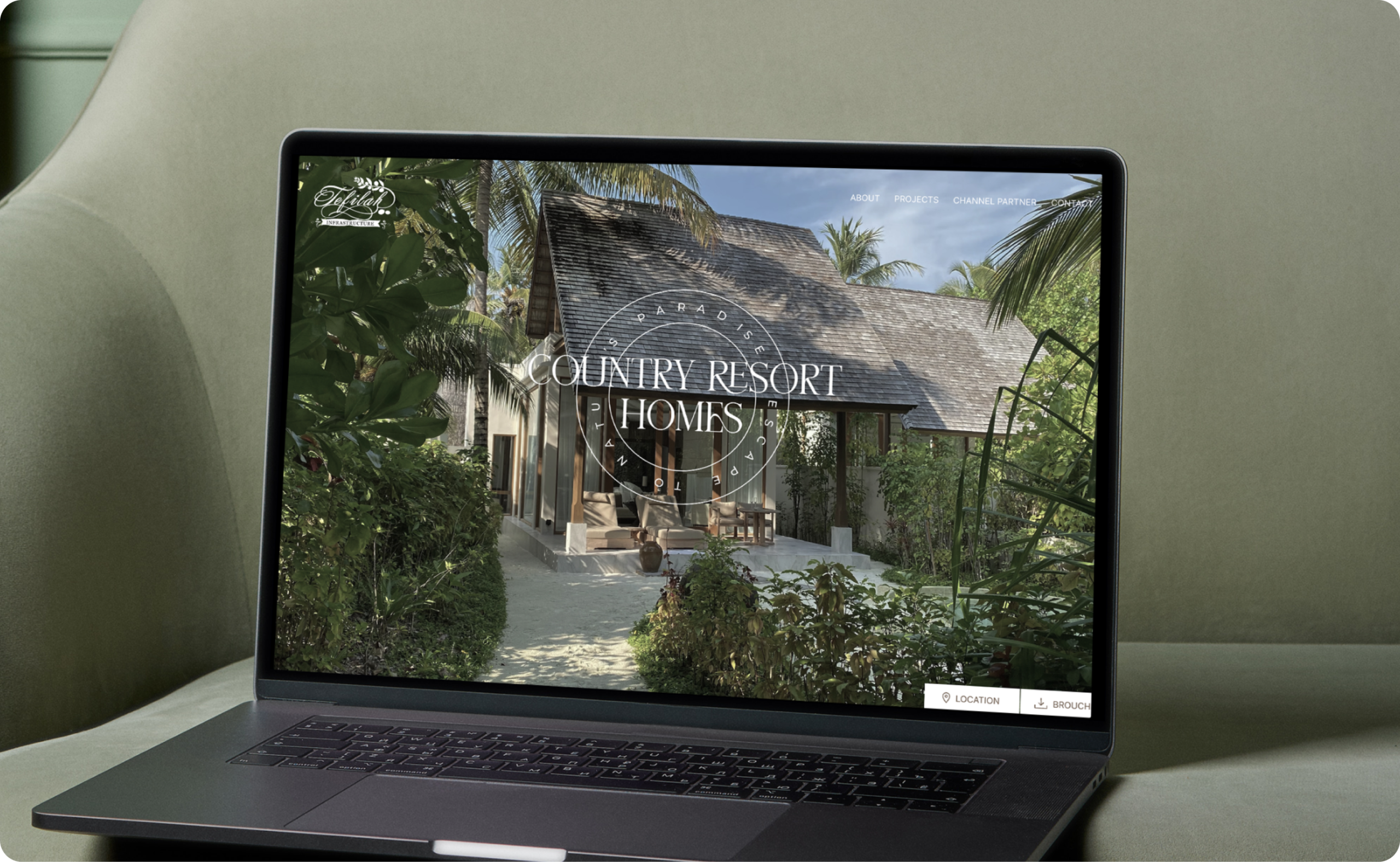 The image of Website laptop mockup of Ampelon country resort homes designed by Wings