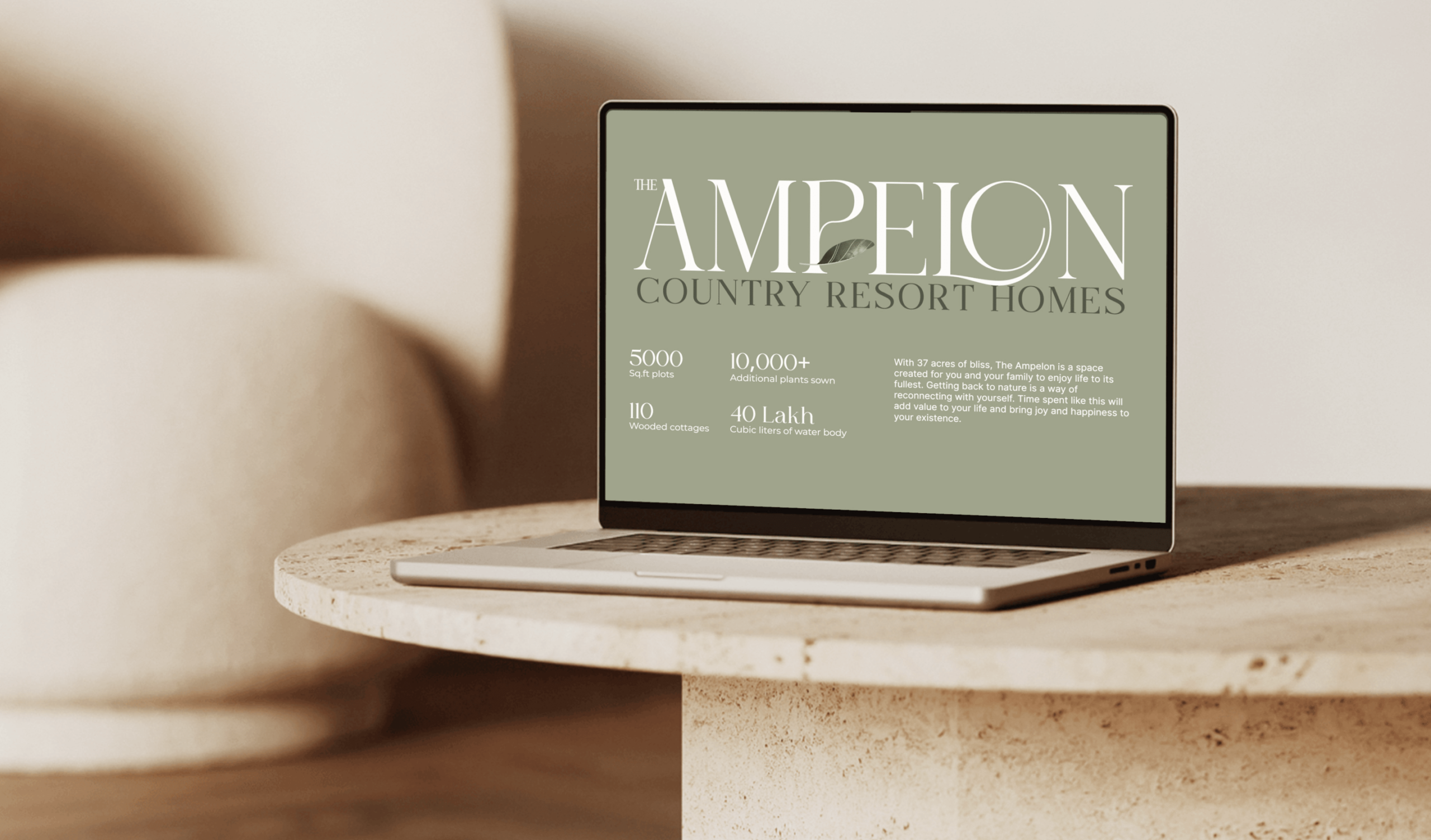 The image of Website laptop mockup of Ampelon country resort homes designed by Wings